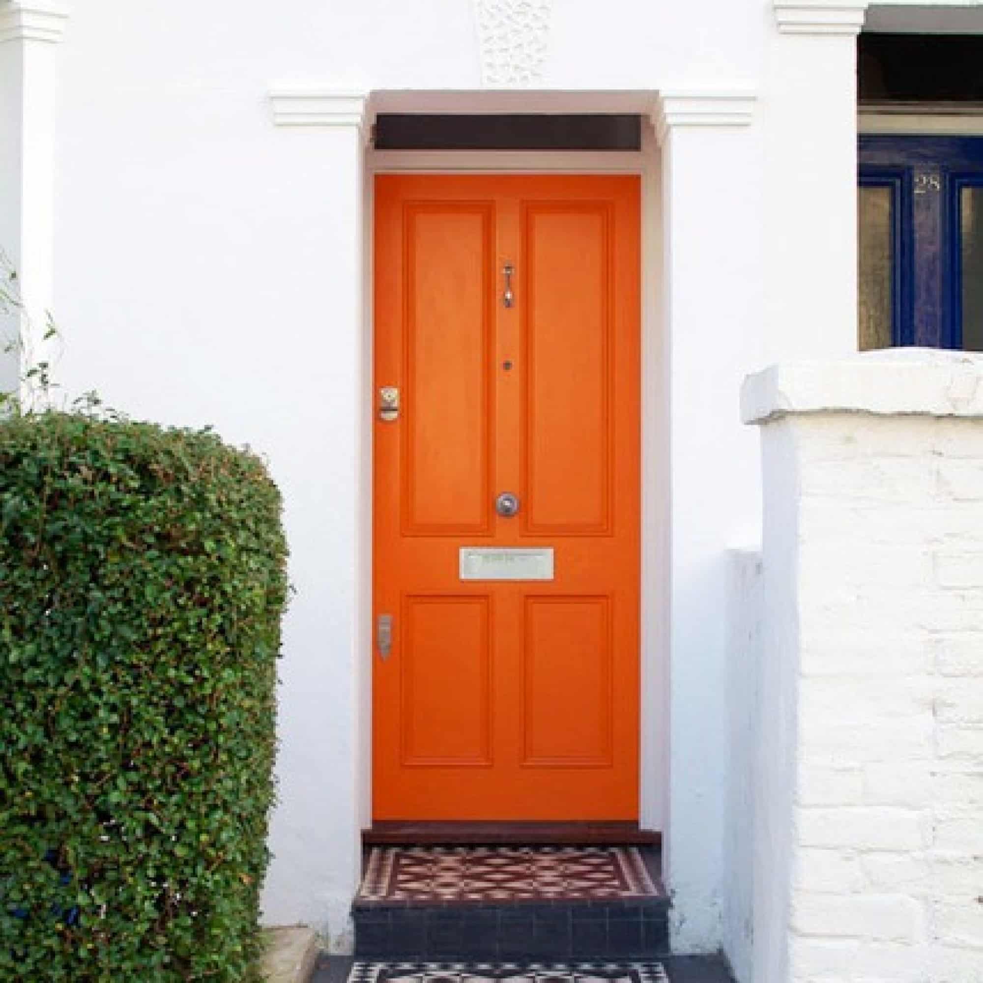 cococozy apartment therapy orange front door