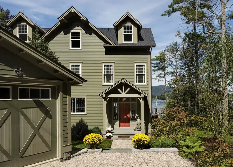 lake house olive green home exterior