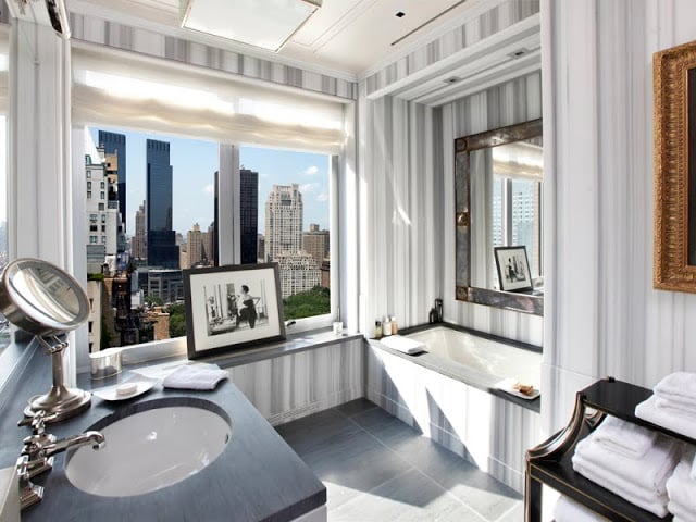 Alt tag for bath+striped+marble+walls+bathroom+guest+picture+window+city+view+gray+black+white+50+million+dollar+new+york+city+apartment+real+estate+cococozy