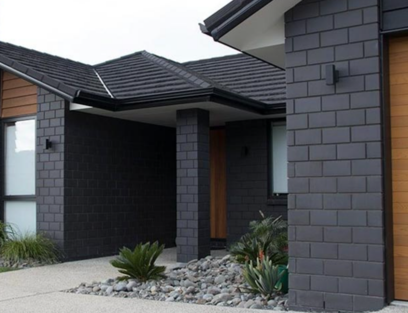 modern black painted brick house