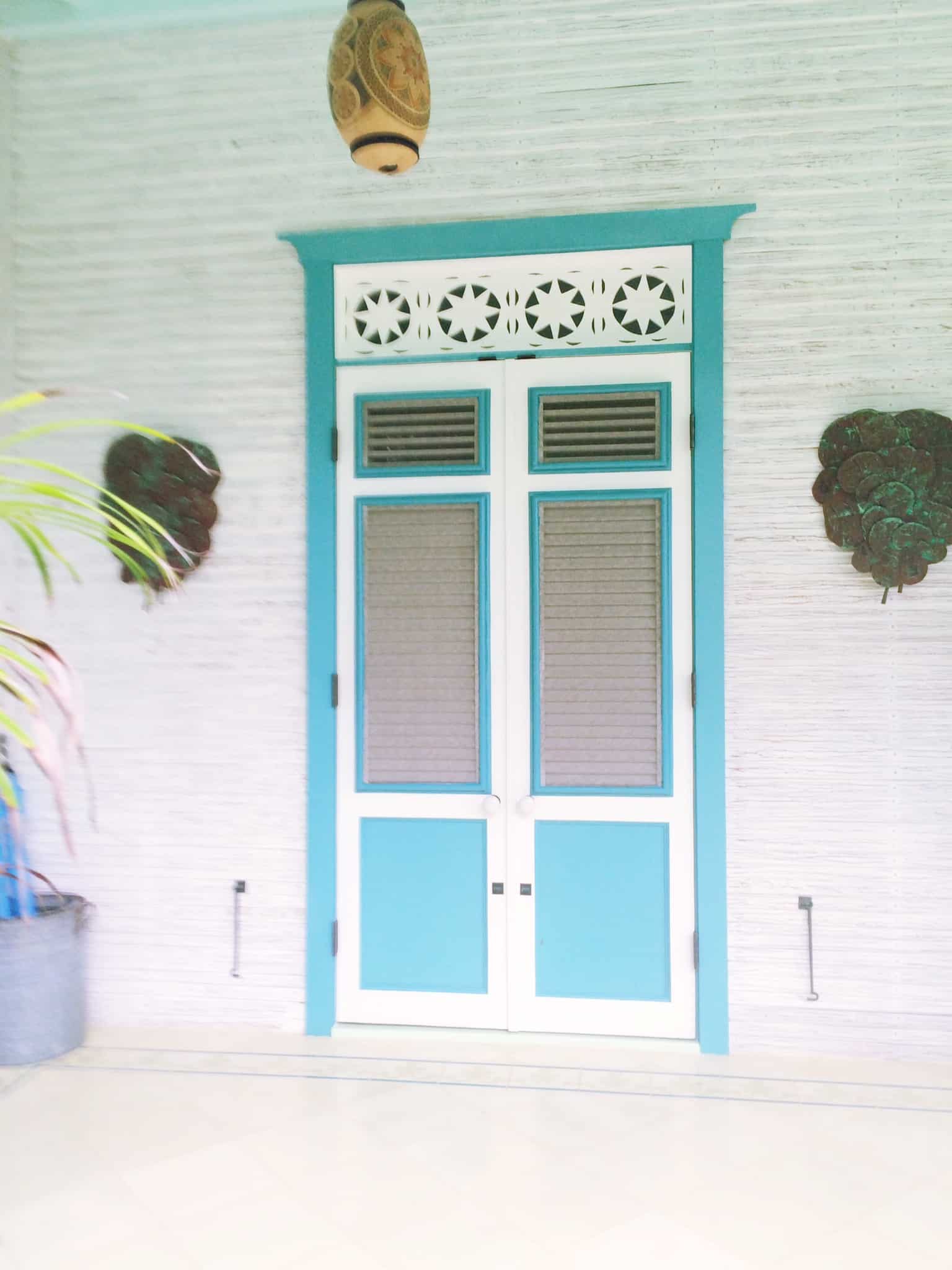 Turquoise blue shutter doors