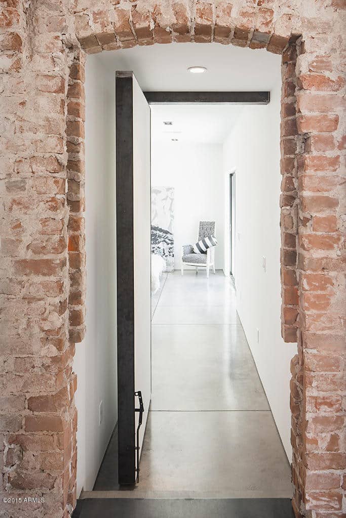 modern  home doorway exposed brick walls cococozy