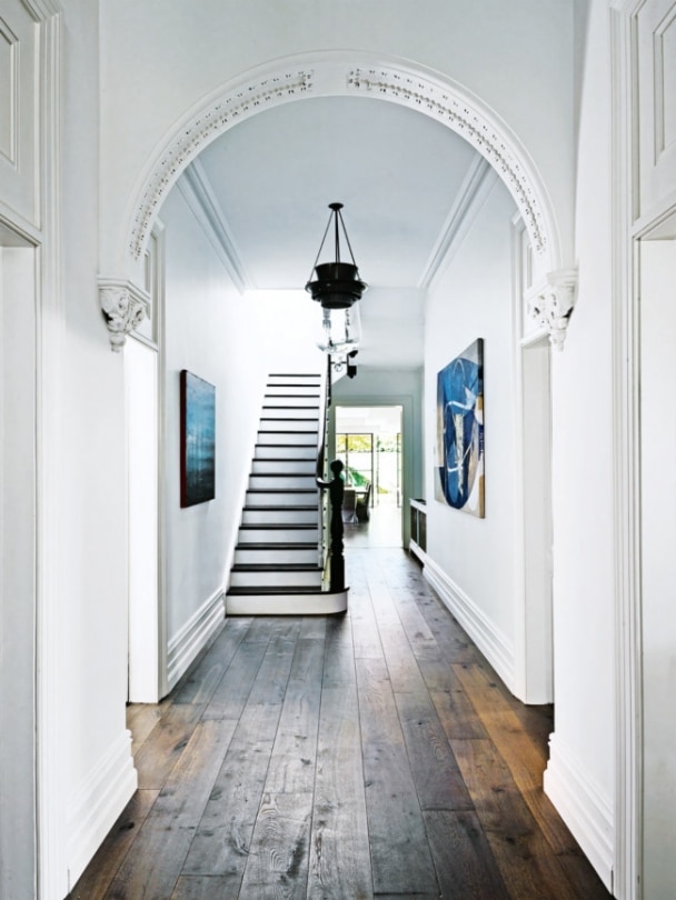 arches in a white foyer