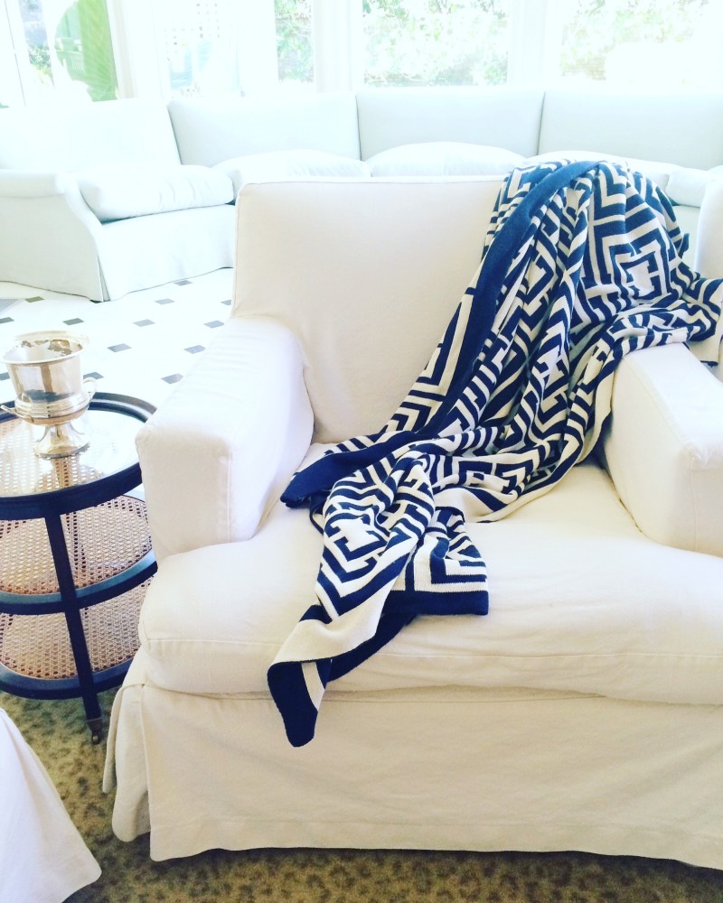 Navy Blue COCOCOZY Logo Throw on White Chair