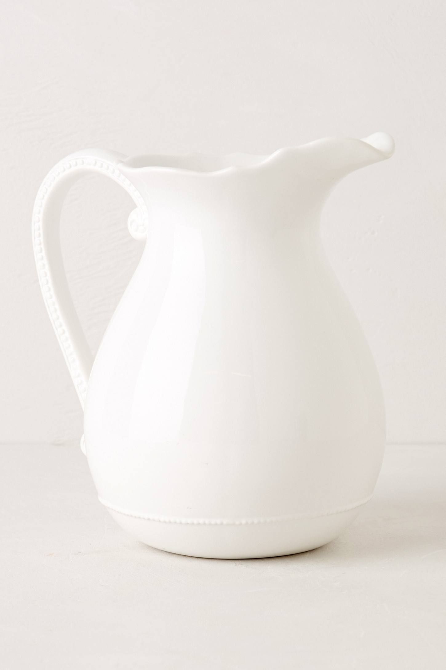 white dolomite glass pitcher