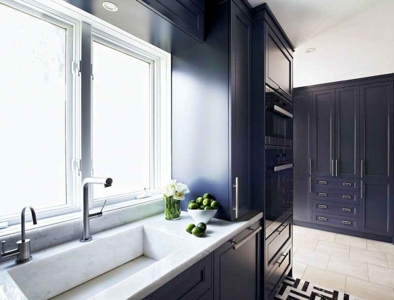Navy blue galley kitchens integrated stone sink
