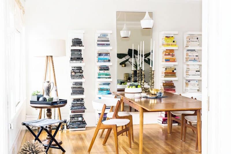 built in bookshelves color coordinated shelves