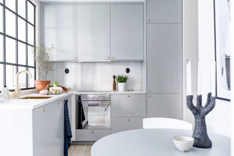 Compact Quarters Apartment Kitchen Grey Cabinets Gold Fixtures
