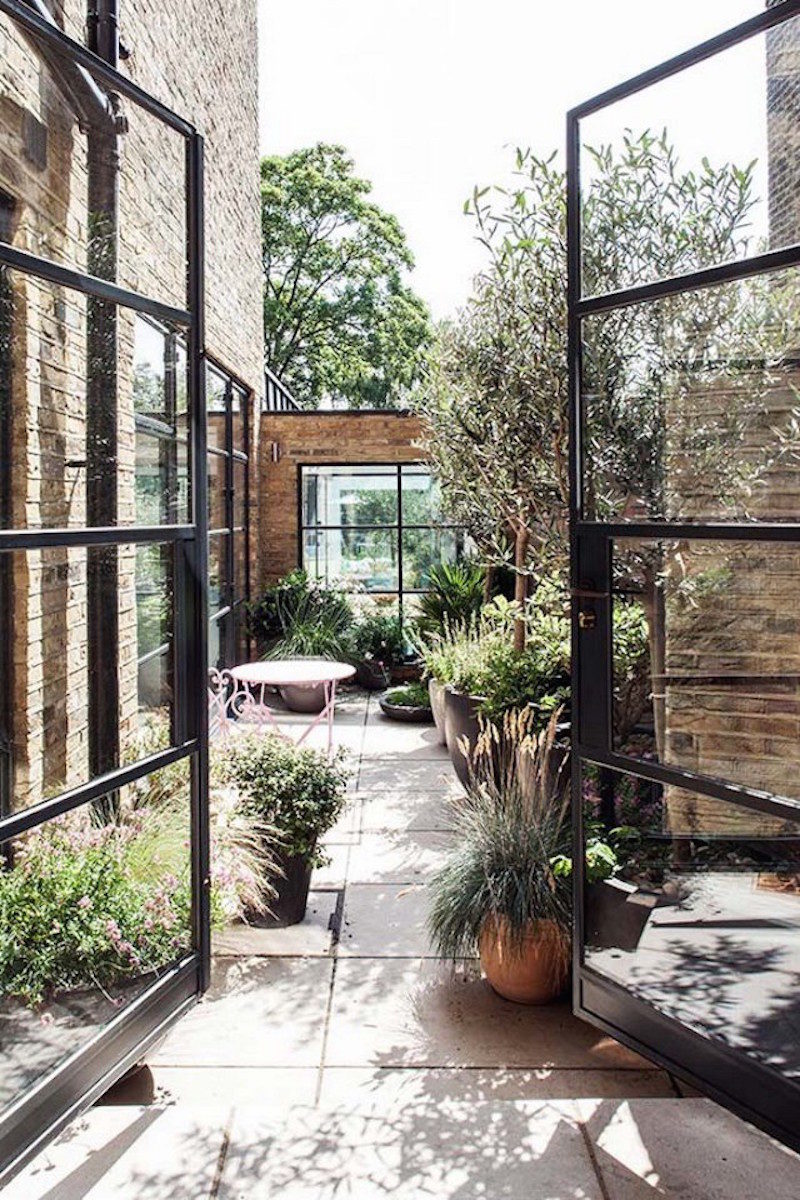 stunning steel windows courtyard