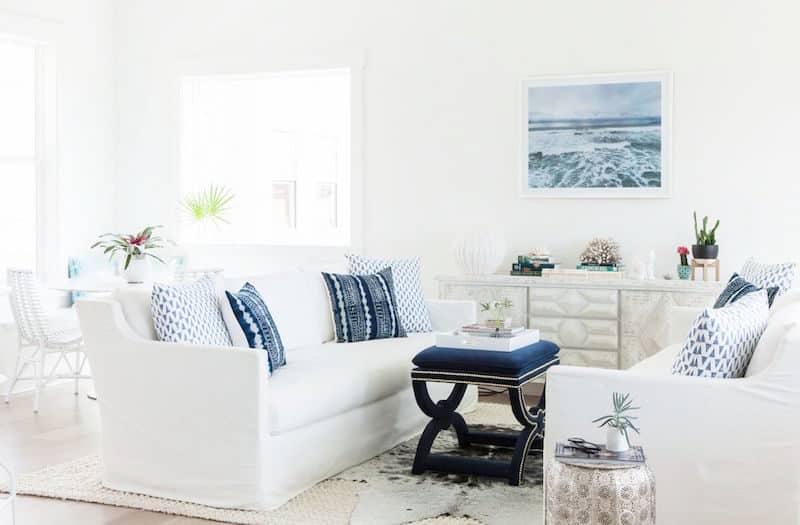 inlet beach house tour living room white couch indigo pillows 