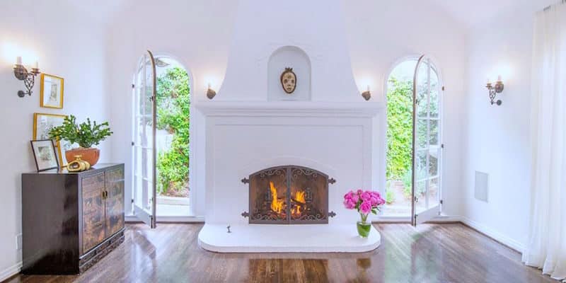 hollywood hills house tour debra messing fireplace living room