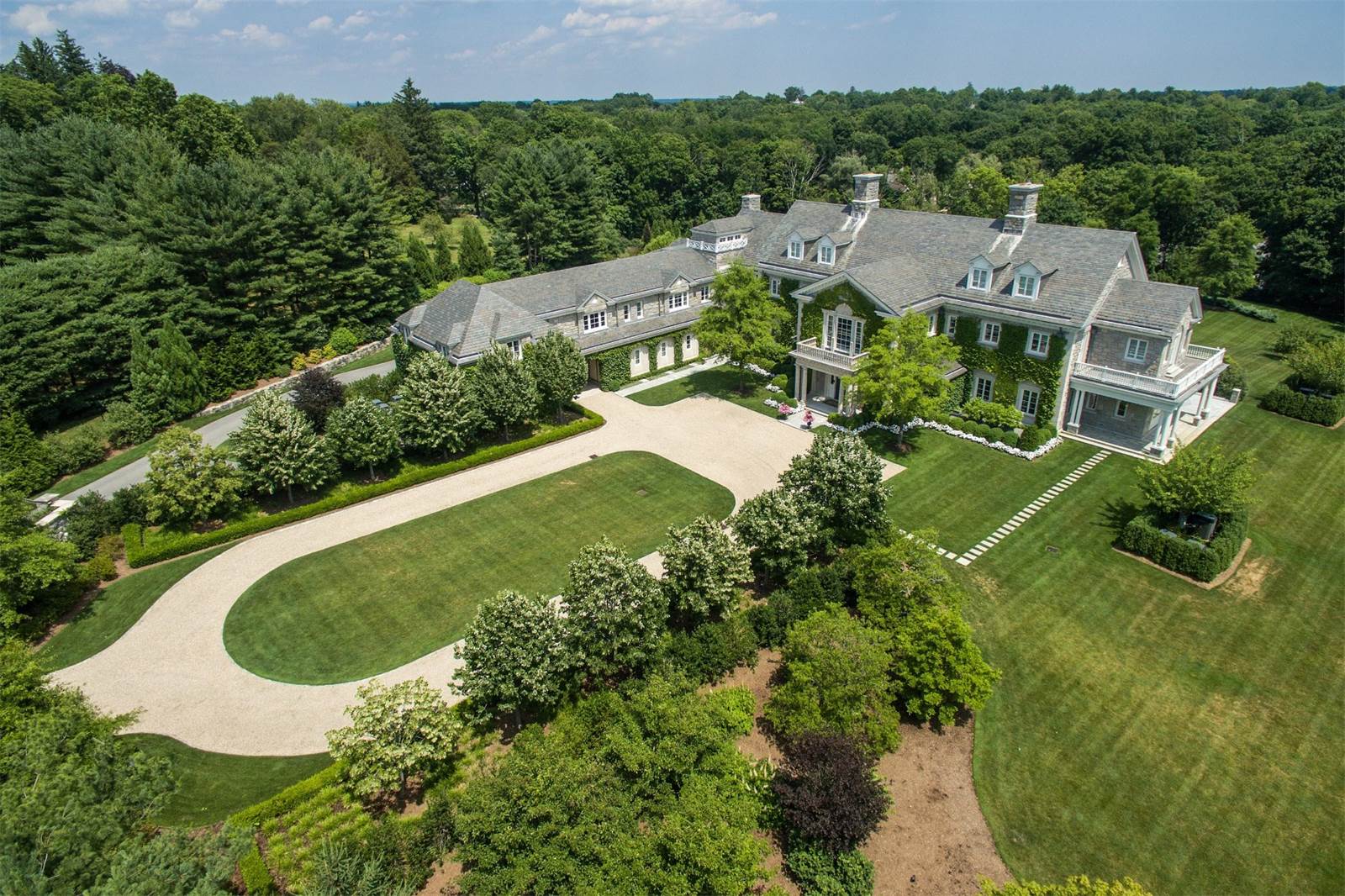 Alt tag for 110-clapboard-ridge-greenwich-connecticut-mansion-real-estate-listing-exterior-aerial-cococozy