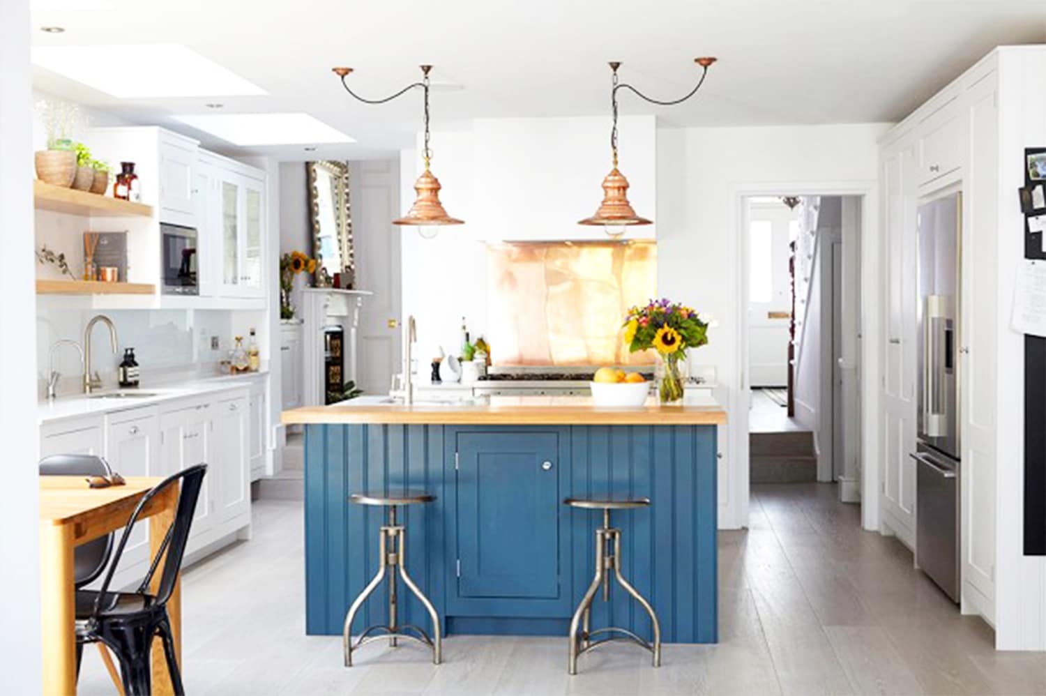Alt tag for copper-kitchen-blue-cococozy-mydomaine
