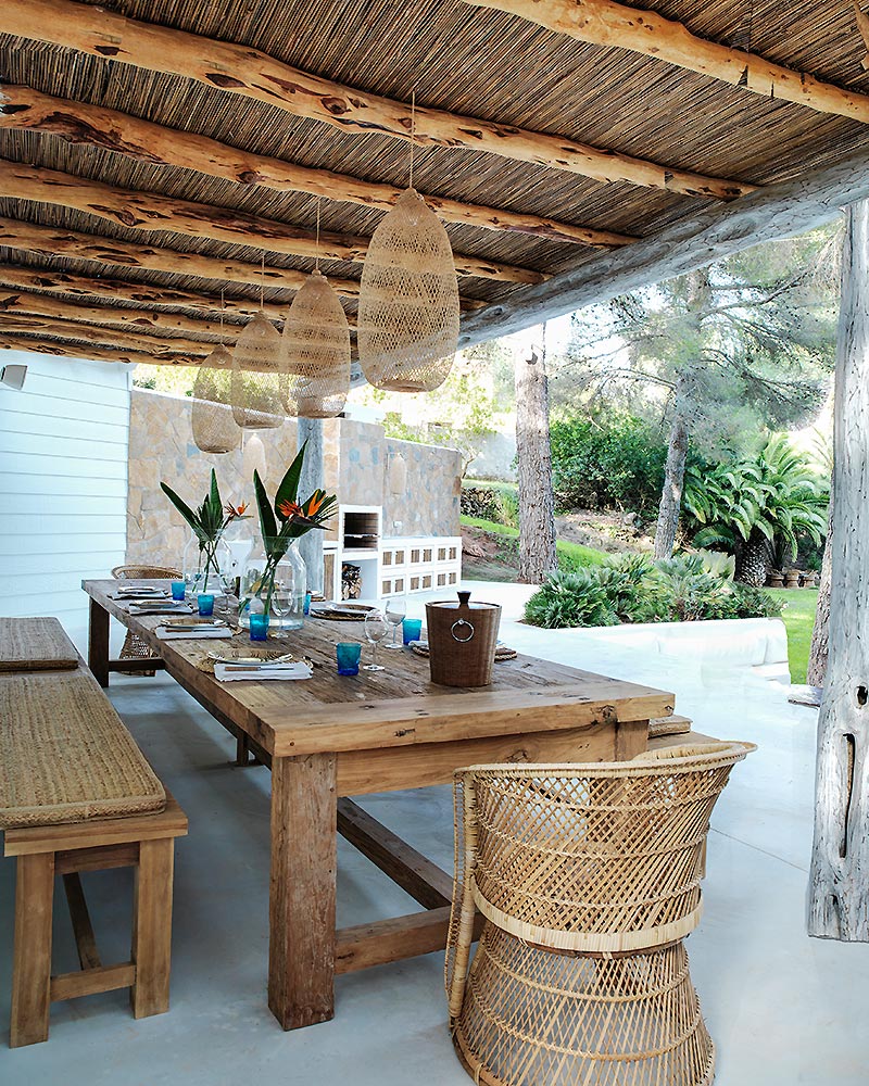 Alt tag for avant-garde-outdoor-dining-room-ibiza-patio-thatch-awning-rustic-cococozy-carolinelegranddesign