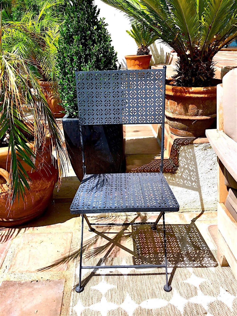 Alt tag for california-spanish-house-courtyard-metal-cut-garden-chair-cococozy