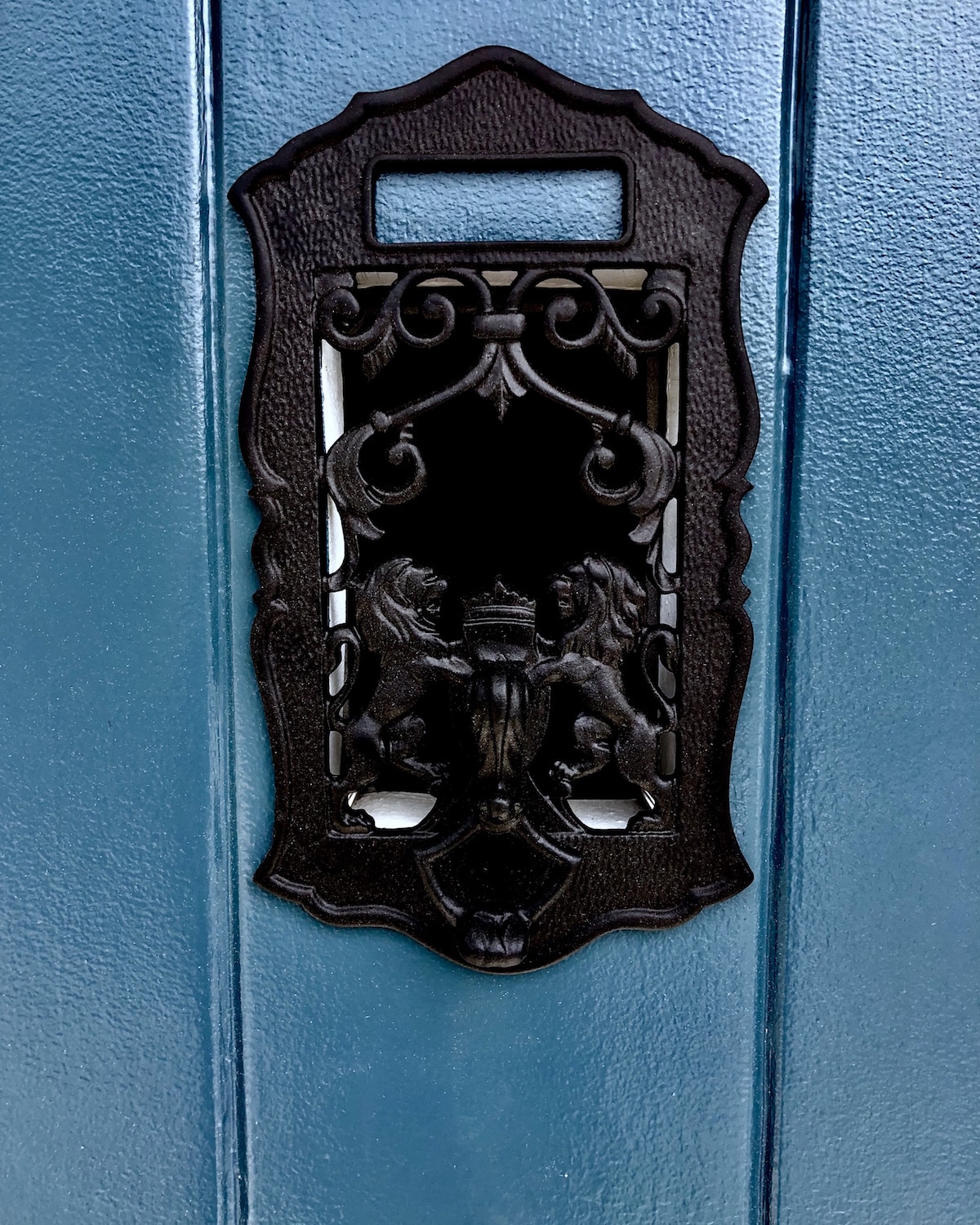 Alt tag for cococozy-design-house-front-door-restore-black-peep-hole-lions-vintage-benjamin-moore-newburg-green copy