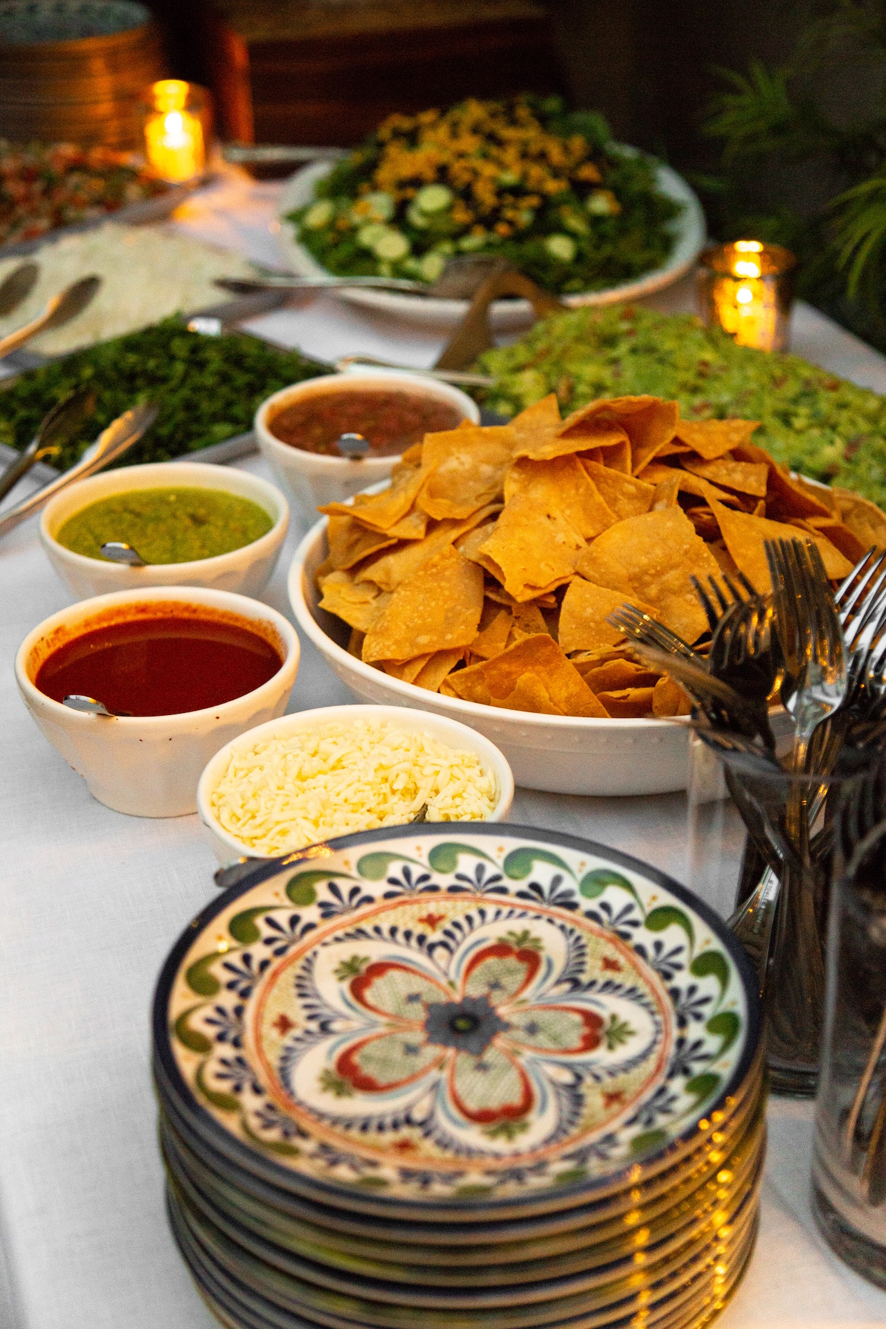 Alt tag for end-of-summer-fiesta-party-taco-party-food-table-tortilla-chips- guacamole-cococozy