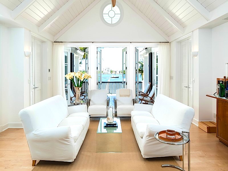 Alt tag for living-room-vaulted-pitched-ceiling-white-modern-palm-beach-home-cococozy
