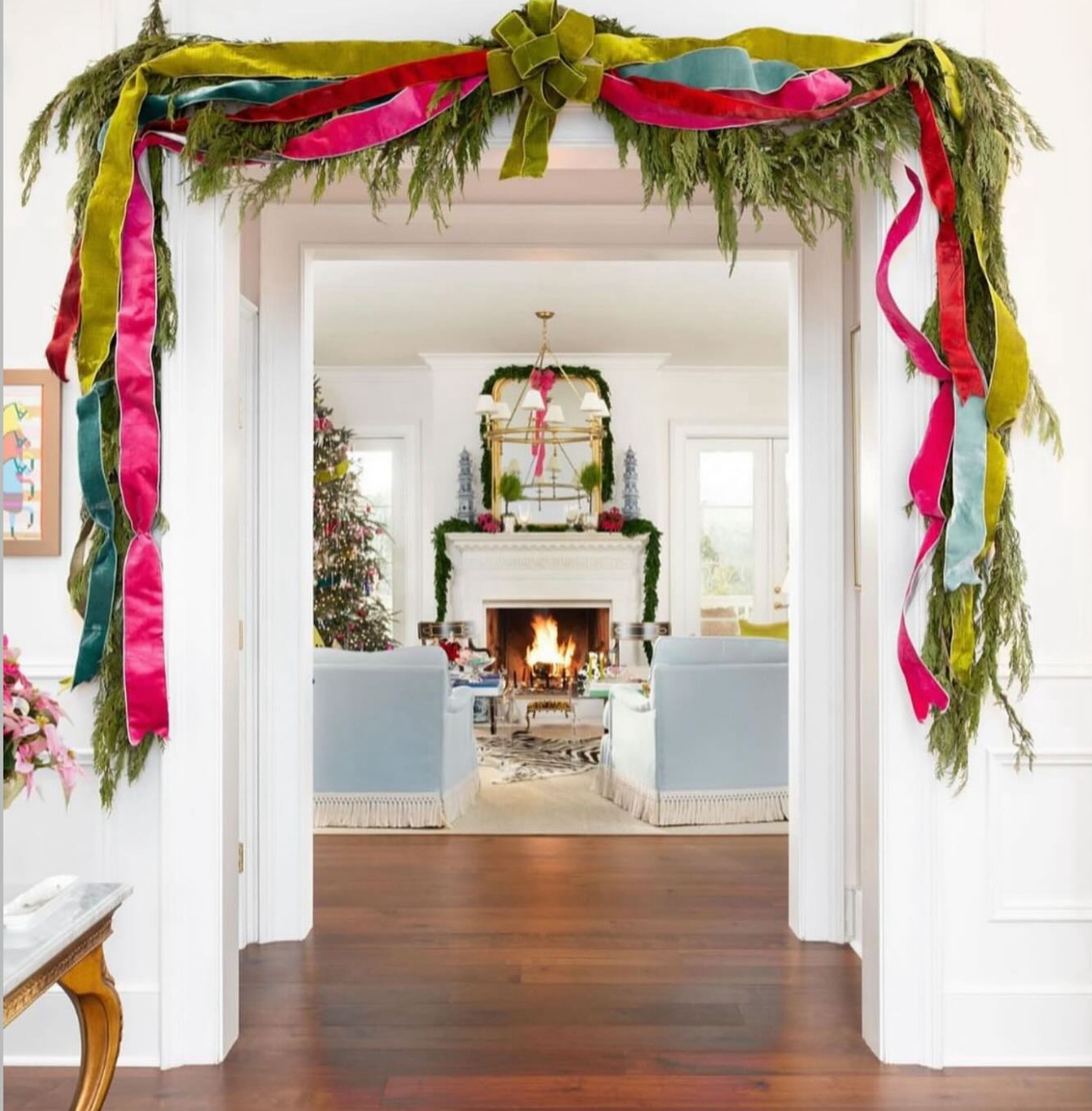 Bright garland in entryway for Christmas