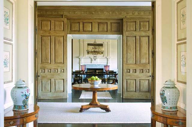 Foyer in a South Carolina estate with beautiful wood paneled doors