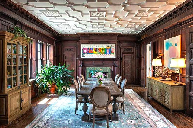 Dining room carved ceilings wood paneled walls in the Copper Beech Farm manison