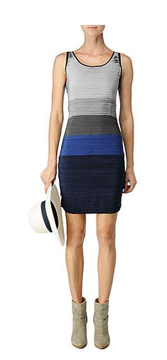 colorblock sleevless dress with silk chiffon layers on a white model wearing grey ankle boots and holding a white hat with a navy band