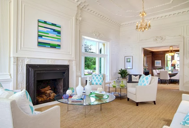 Living room in a historic San Francisco mansion with decorative moldings & high ceilings