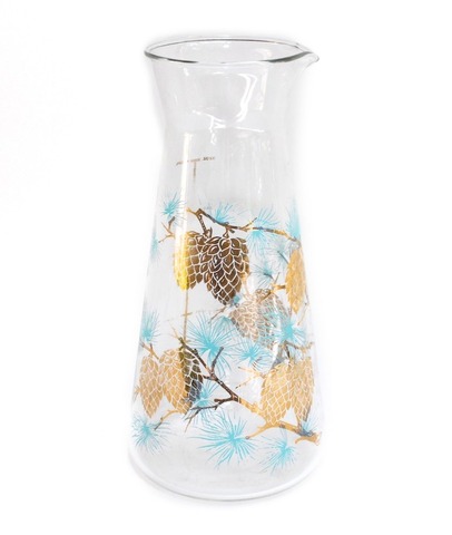 Glass carafe with blue and gold pine cone detail