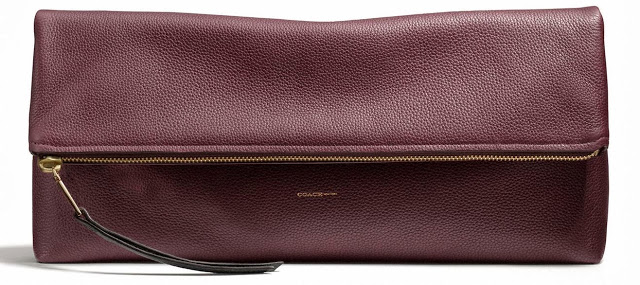 Large Coach clutchable in oxblood pebbled leather