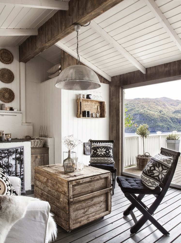 Living room in a white rustic Scandinavian cottage