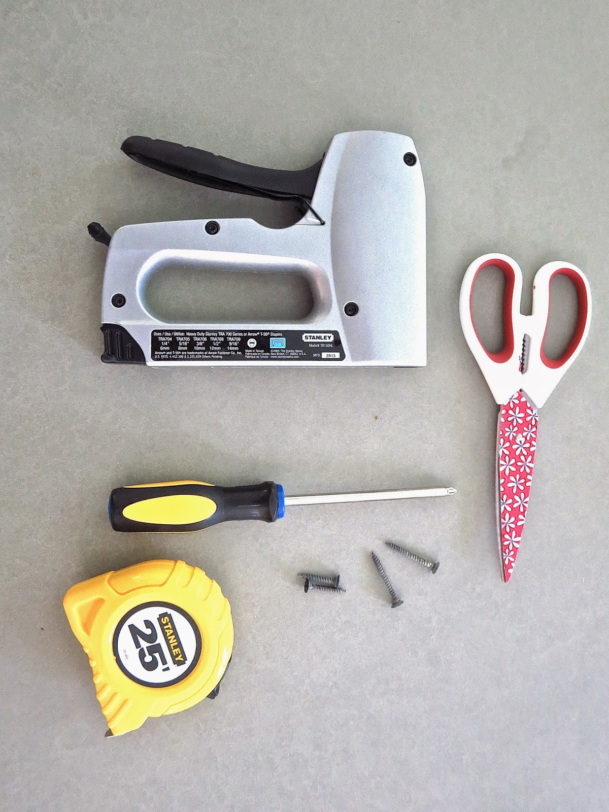 tools staple gun scissors screw driver measuring tape