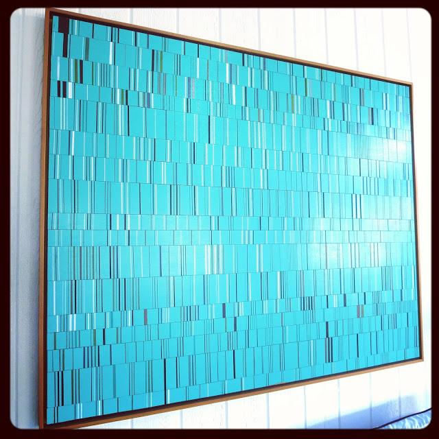 Turquoise wood and paint piece by Brian Wills in Coco of COCOCOZY's living room