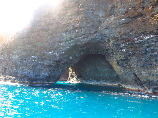 Arch cave entrance Na Pali Coast napali hawaii kauai ocean blue water sea