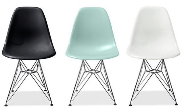 Black, light blue and white Eames chairs