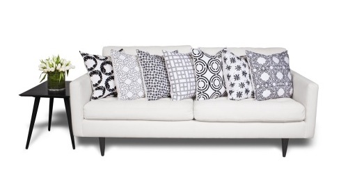 COCOCOZY Light Pillows on a white sofa