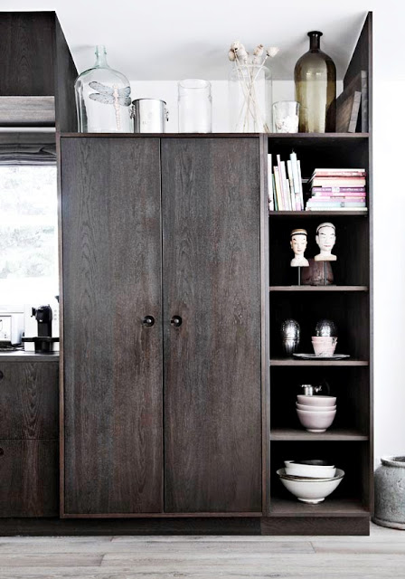 close up of wooden kitchen pantry and shelves