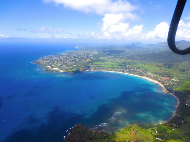 north shore kauai ocean cove beach water coastline aerial view helicopter