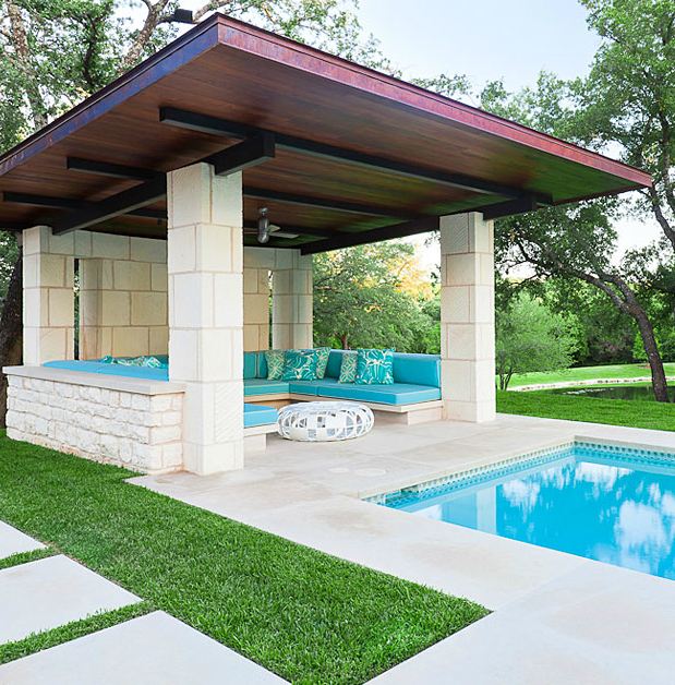 modern pool lounge area with cushions that match the pool