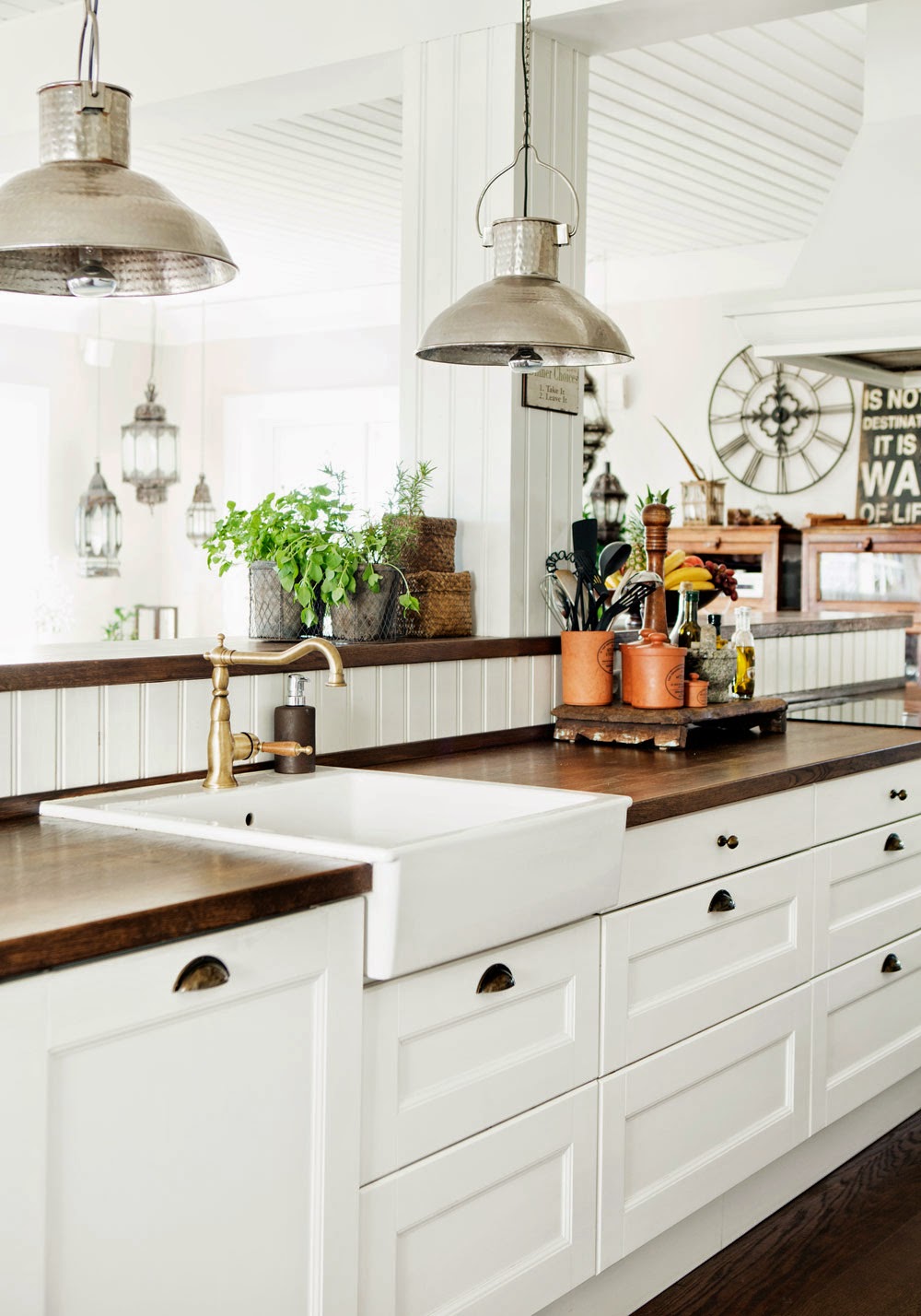Classic farm style kitchen with butcher block wood counters in a Swedish home