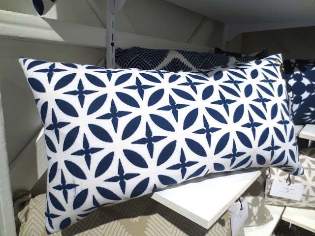 blue and white accent pillow