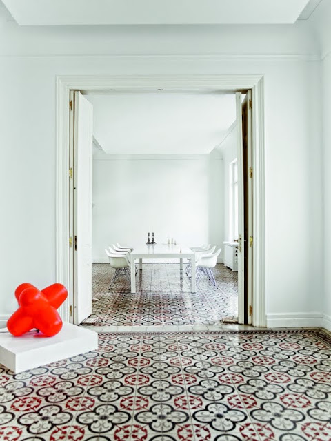 white dining room with Moroccan tiles 