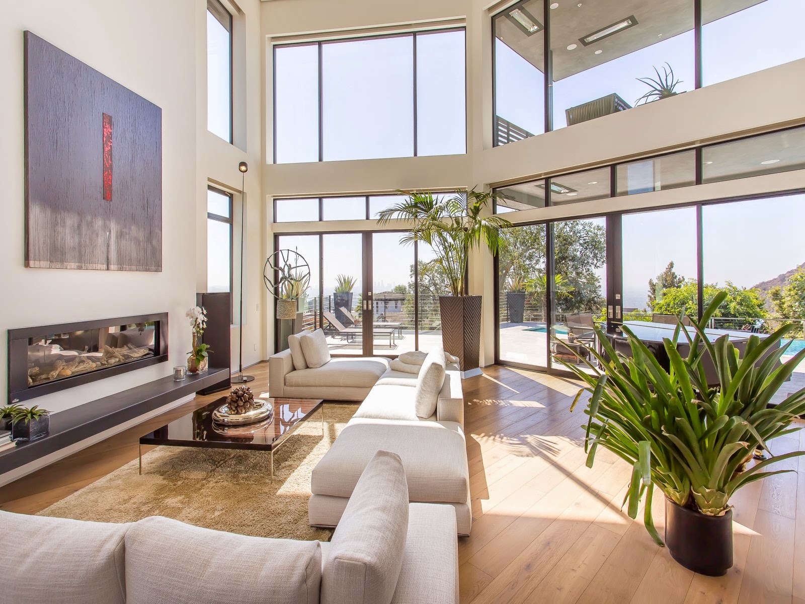 Hollywood estate with light wood floor and large windows