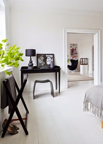 White bedroom with black accents