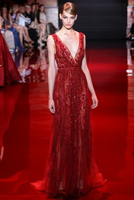 Model wearing a red Elie Saab haute couture dress