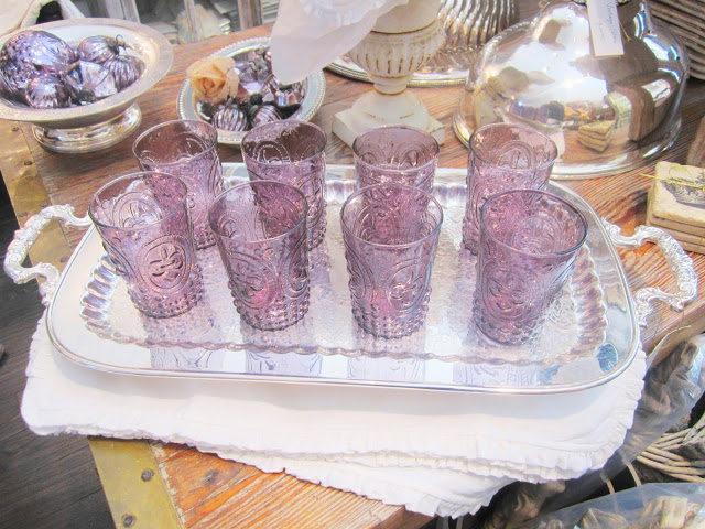 Lavender glasses on a polished metal tray