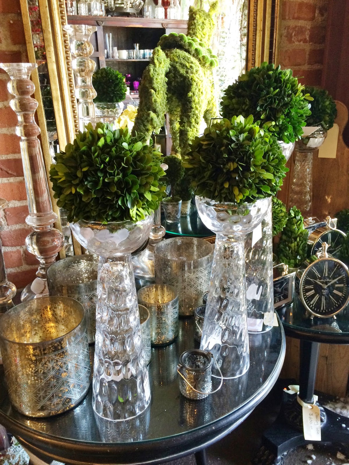 Glass stands with round topiary balls