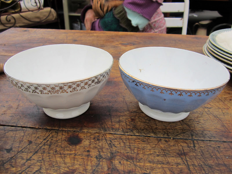 Two French vintage porcelain bowls with gold detailing on the rim