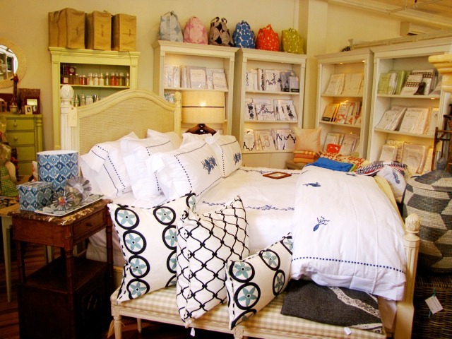 COCOCOZY Vent  and Fence pillows as part of a bedroom display