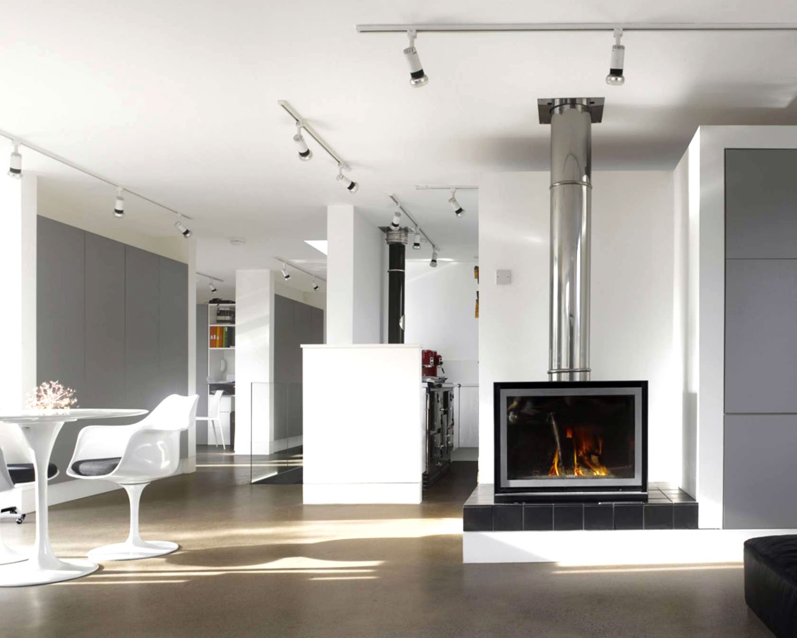 Modern white and grey open living, dining and kitchen area