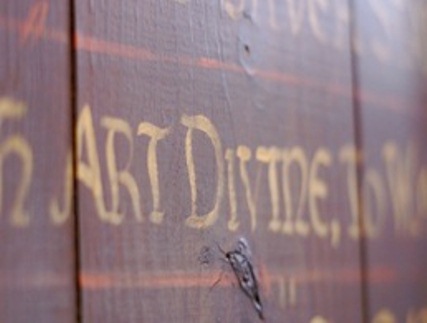 Close up of the hand painted text in the den